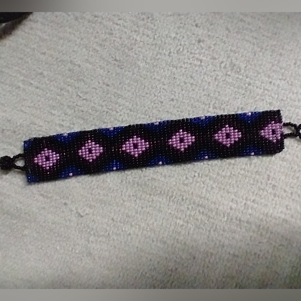 Purple pink black ethnic tribal flat beaded woven bracelet